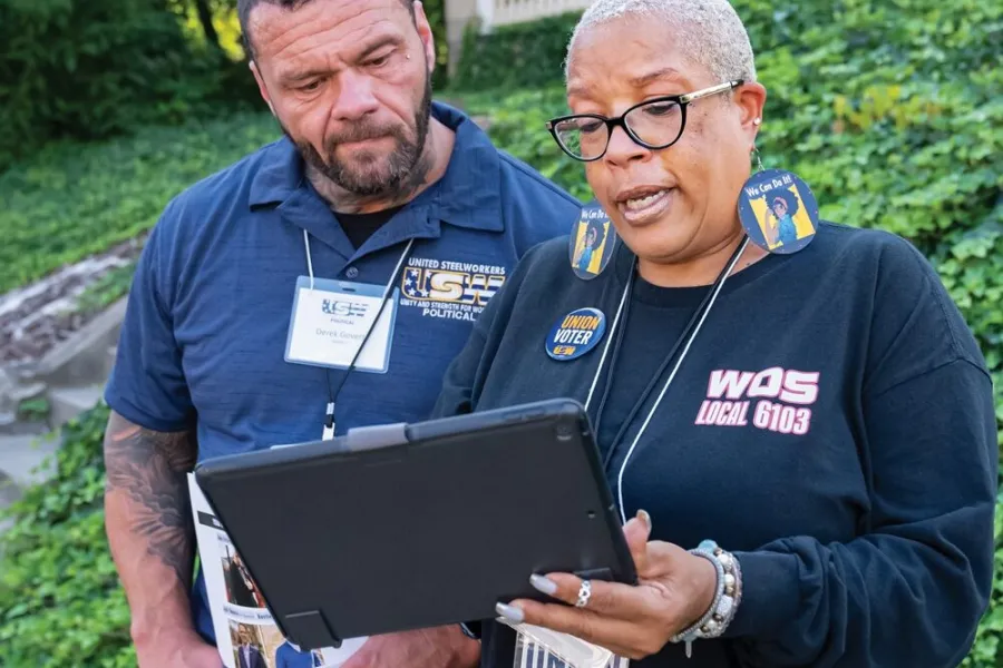 workers with a clipboard