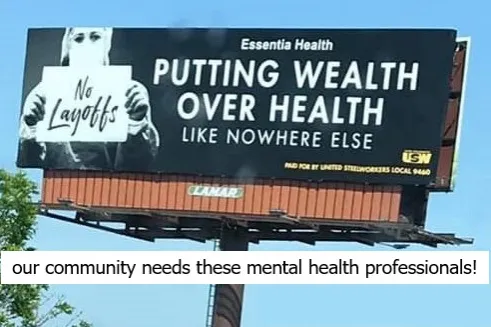 billboard that says "Essentia Health: Putting Wealth Over Health Like Nowhere Else"