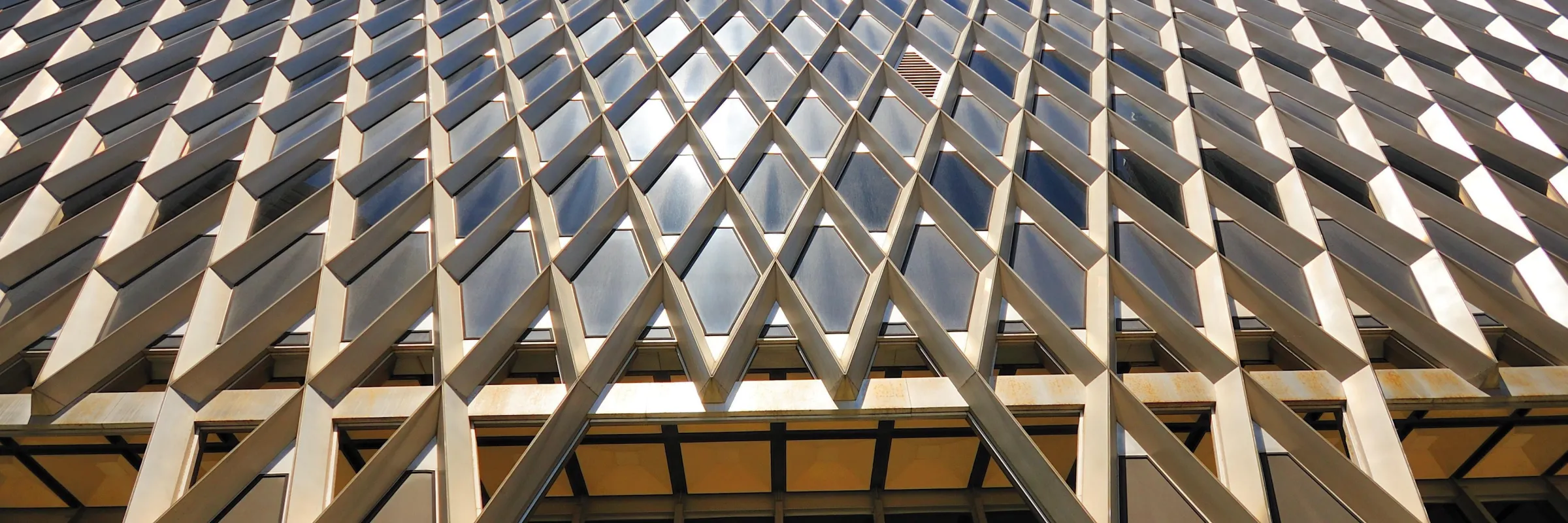 photo looking up at a tall building