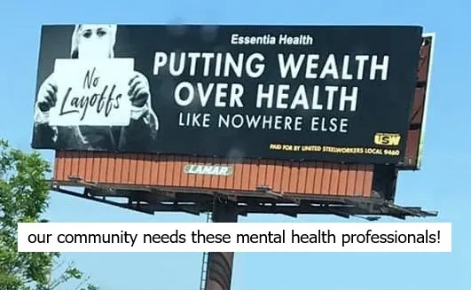 billboard that says "Essentia Health: Putting Wealth Over Health Like Nowhere Else"