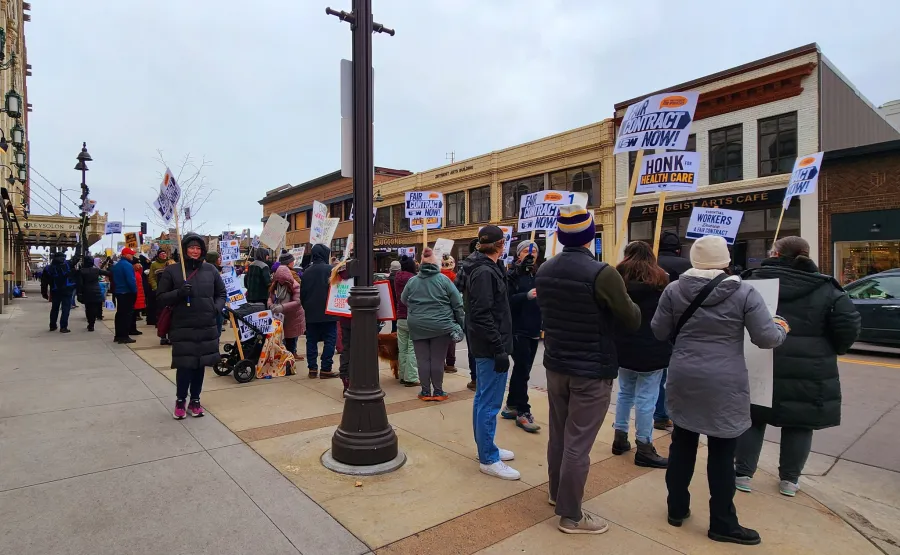 image of workers protesting