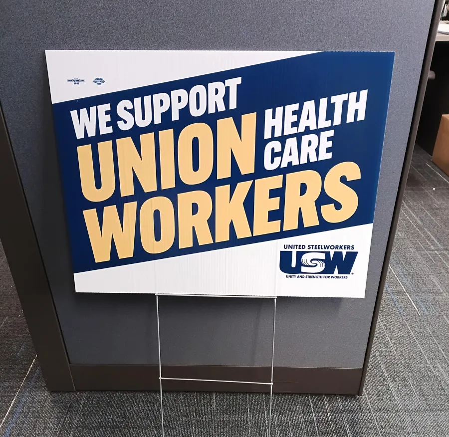 phot of yard sign that says "we support union health care workers"
