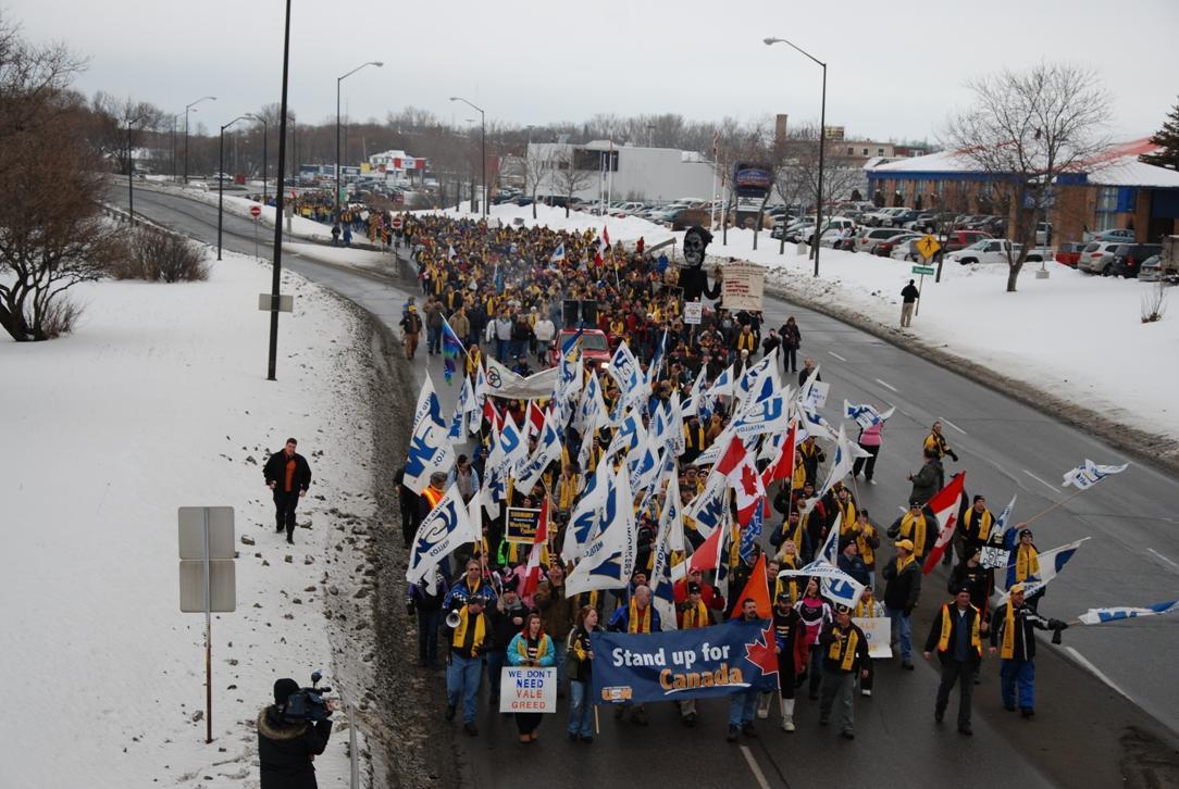 workers marching in the winter